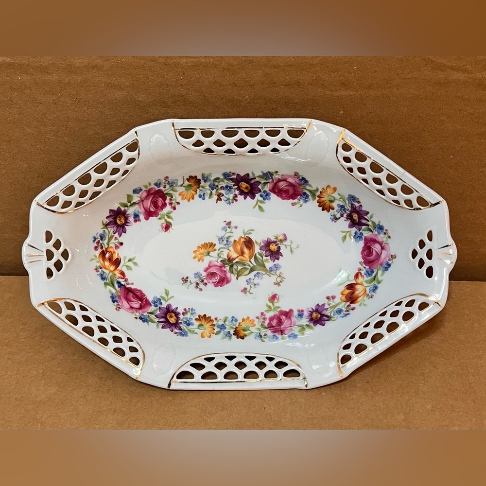 Antique, oval, reticulated, floral bowl by Schwarzenhammer Bavaria.